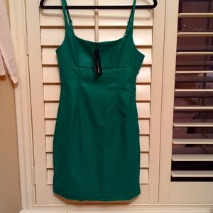 Super cute faux leather mini dress, looks like Leather!! Great material! Green